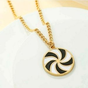 Black and White Swirl Pendant/Goldtone Necklace